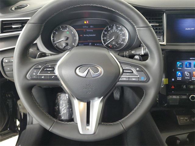 Photo of 2025 Black Obsidian INFINITI QX55