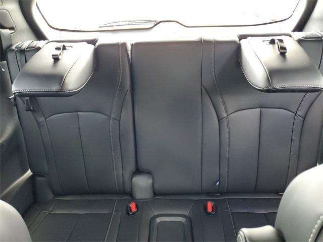 Photo of 2025 Majestic White/Black Obsidian INFINITI QX60