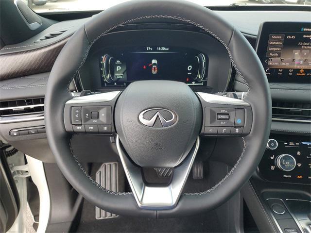 Photo of 2025 Majestic White/Black Obsidian INFINITI QX60