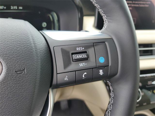 Photo of 2025 Warm Titanium INFINITI QX60
