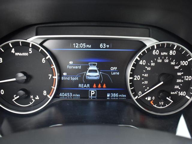 Photo of 2024 Pearl White Tricoat Nissan Altima