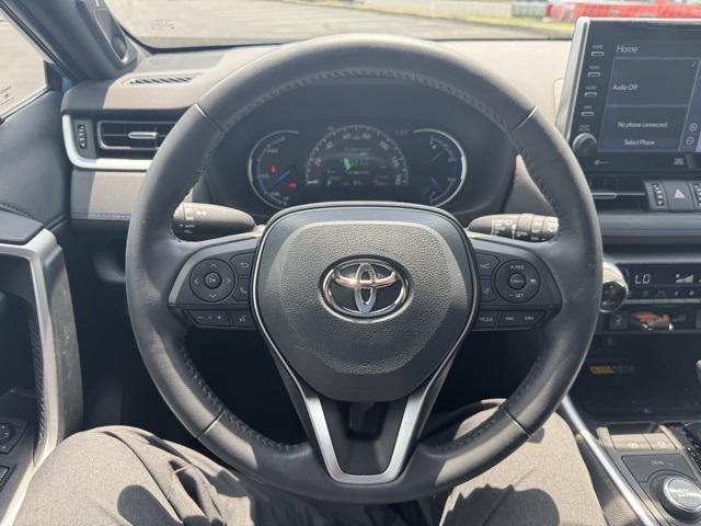 Photo of 2022 Cavalry Blue/Midnight Black Metallic Toyota RAV4 Hybrid