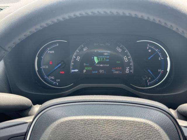 Photo of 2022 Cavalry Blue/Midnight Black Metallic Toyota RAV4 Hybrid