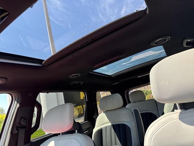 Photo of 2026 Glacier White Pearl/Ebony Black Roof Kia EV9