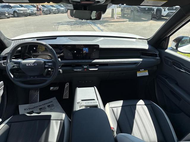 Photo of 2026 Glacier White Pearl/Ebony Black Roof Kia EV9