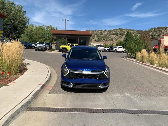 Photo of 2023 Sapphire Blue Kia Sportage