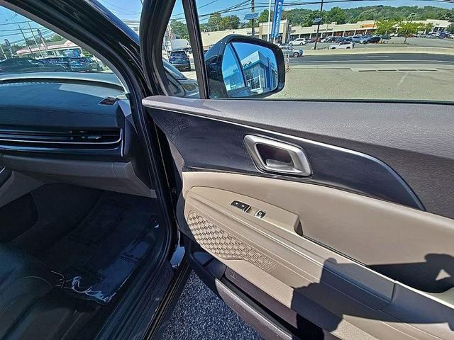 Photo of 2025 Aurora Black Pearl Kia Carnival