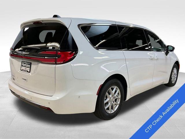 Photo of 2025 Bright White Clearcoat Chrysler Pacifica