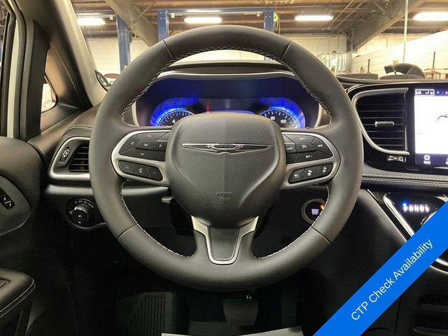 Photo of 2025 Bright White Clearcoat Chrysler Pacifica