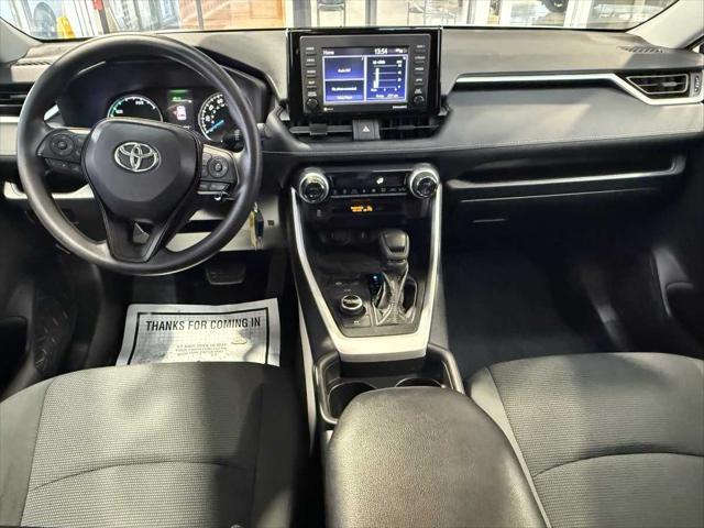 Photo of 2021 Super White Toyota RAV4 Hybrid