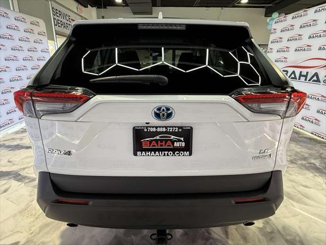 Photo of 2021 Super White Toyota RAV4 Hybrid