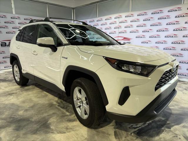 Photo of 2021 Super White Toyota RAV4 Hybrid