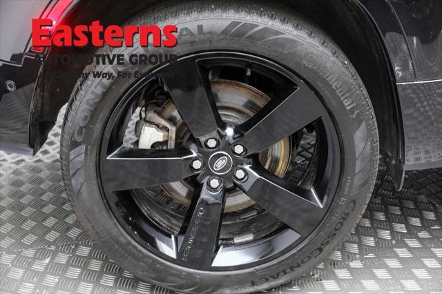 Photo of 2024 Santorini Black Metallic Land Rover Defender