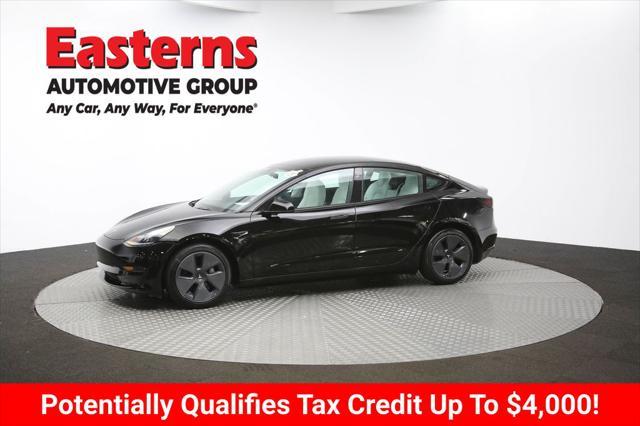Photo of 2022 Solid Black Tesla Model 3