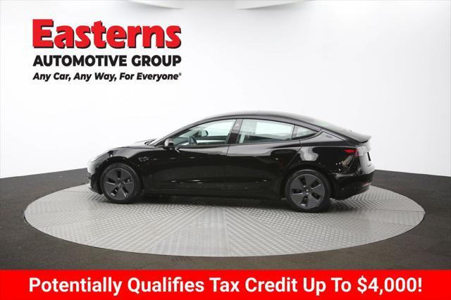 Photo of 2022 Solid Black Tesla Model 3