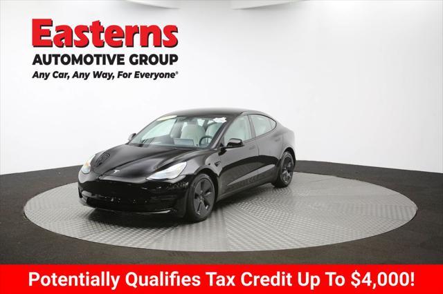 Photo of 2022 Solid Black Tesla Model 3