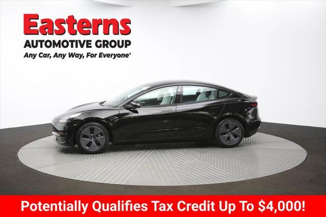 Photo of 2022 Solid Black Tesla Model 3