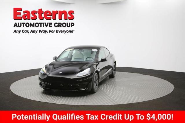 Photo of 2022 Solid Black Tesla Model 3