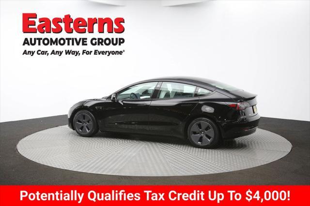Photo of 2022 Solid Black Tesla Model 3