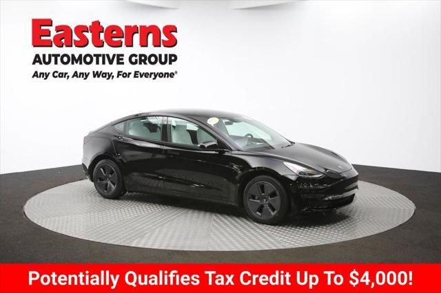 Photo of 2022 Solid Black Tesla Model 3