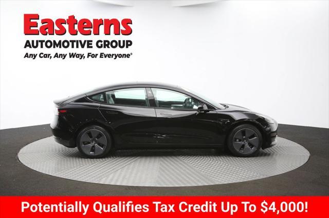 Photo of 2022 Solid Black Tesla Model 3