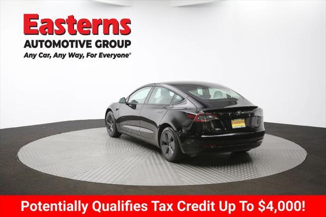 Photo of 2022 Solid Black Tesla Model 3