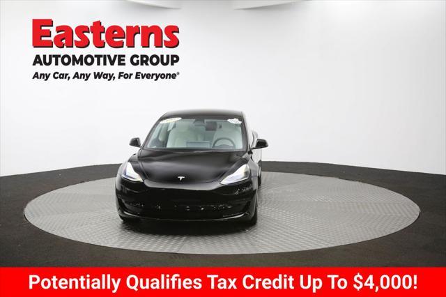 Photo of 2022 Solid Black Tesla Model 3