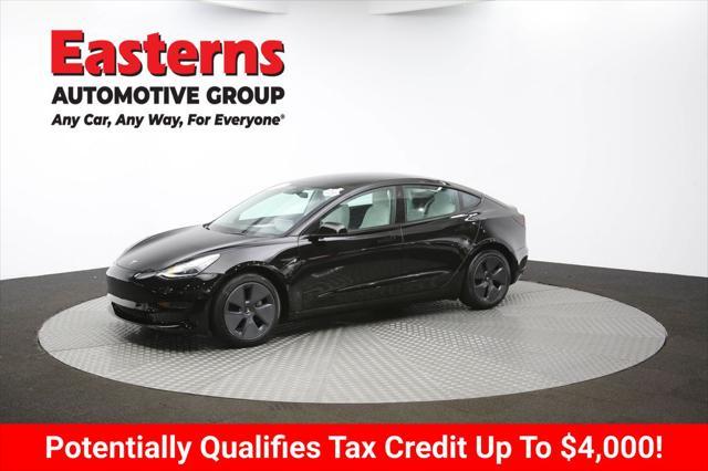 Photo of 2022 Solid Black Tesla Model 3