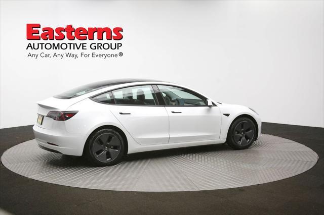Photo of 2021 Pearl White Multi-Coat Tesla Model 3