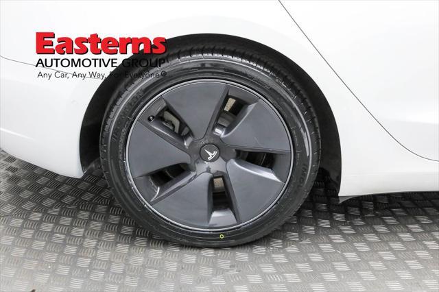 Photo of 2021 Pearl White Multi-Coat Tesla Model 3