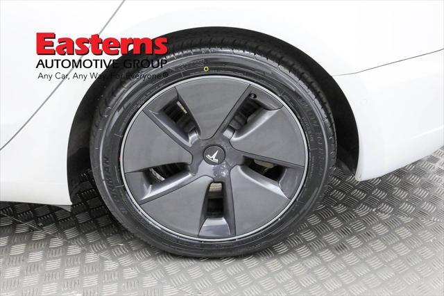 Photo of 2021 Pearl White Multi-Coat Tesla Model 3