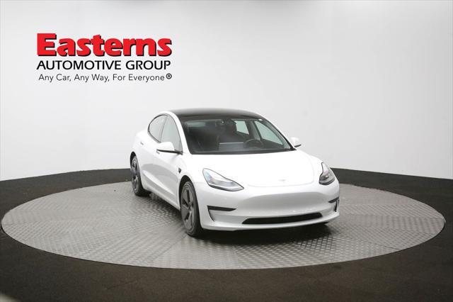 Photo of 2021 Pearl White Multi-Coat Tesla Model 3