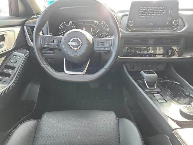 Photo of 2024 Scarlet Ember Tintcoat Nissan Rogue