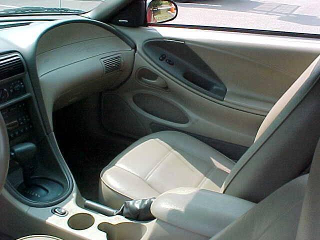 Photo of 2004 Burgundy Ford Mustang