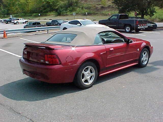 Photo of 2004 Burgundy Ford Mustang