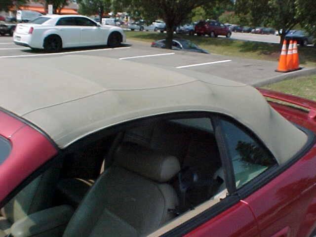Photo of 2004 Burgundy Ford Mustang