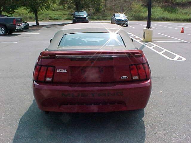 Photo of 2004 Burgundy Ford Mustang