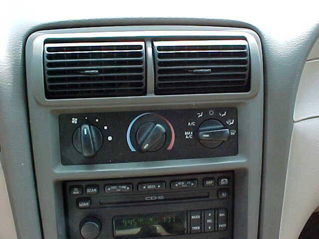 Photo of 2004 Burgundy Ford Mustang