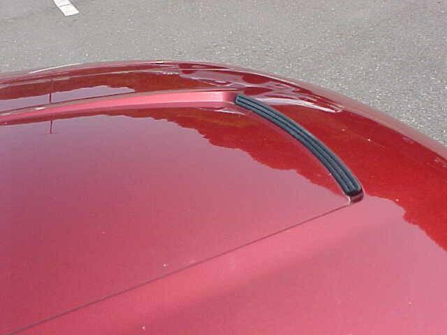 Photo of 2004 Burgundy Ford Mustang