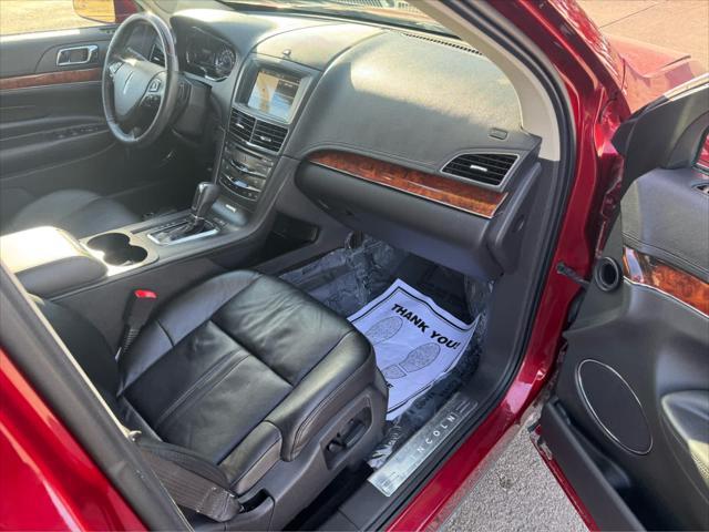 Photo of 2019 Ruby Red Metallic Tinted Clearcoat Lincoln MKT