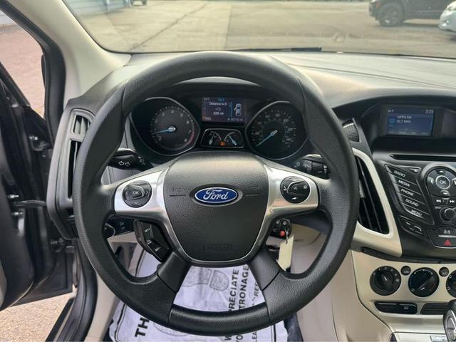 Photo of 2014 Sterling Gray Metallic Ford Focus