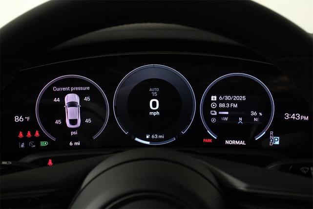 Photo of 2025 Black Porsche Taycan