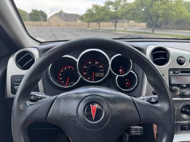 Photo of 2004 Fusion Orange Metallic Pontiac Vibe