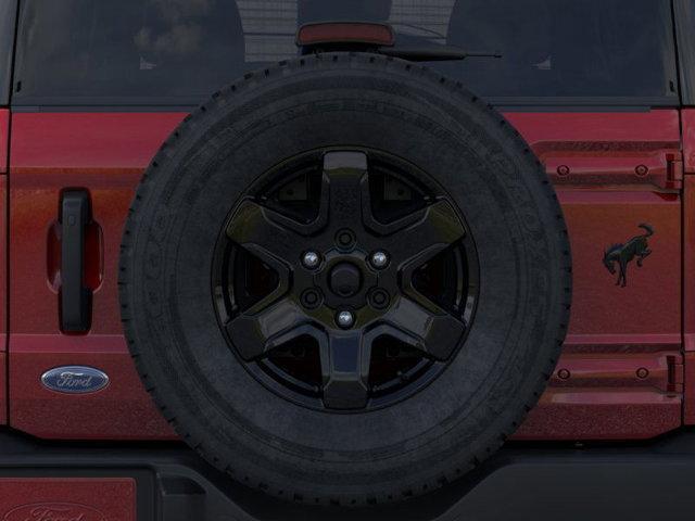 Photo of 2025 Ruby Red Metallic Tinted Clearcoat Ford Bronco