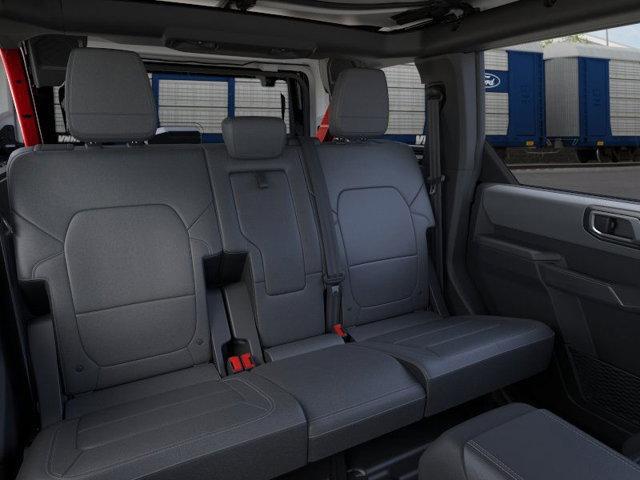 Photo of 2025 Ruby Red Metallic Tinted Clearcoat Ford Bronco