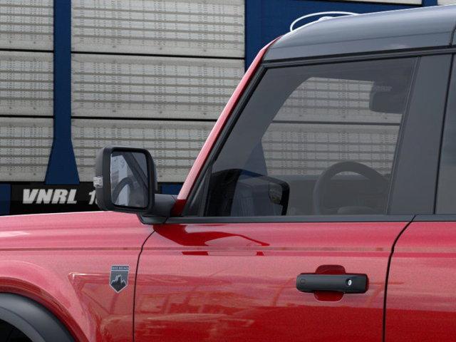 Photo of 2025 Ruby Red Metallic Tinted Clearcoat Ford Bronco