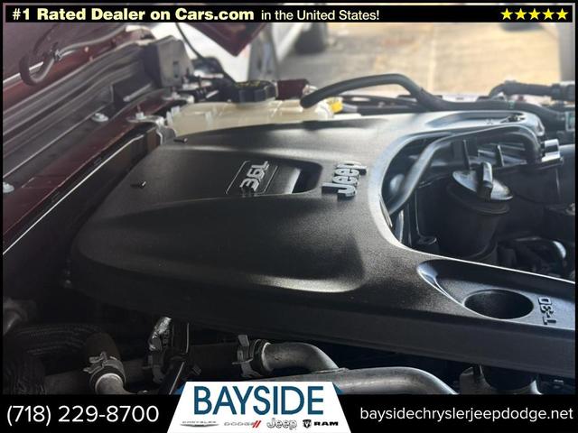 Photo of 2021 Snazzberry Pearlcoat Jeep Wrangler Unlimited