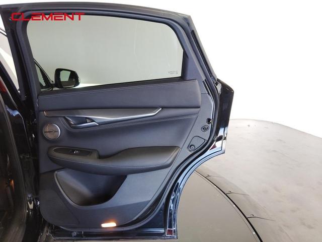 Photo of 2024 Black Obsidian INFINITI QX55