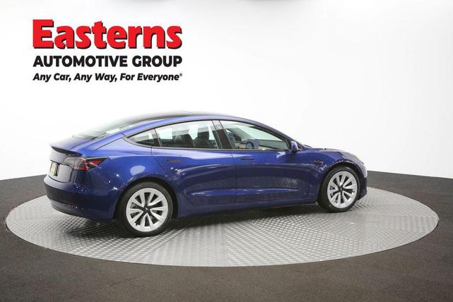 Photo of 2022 Deep Blue Metallic Tesla Model 3