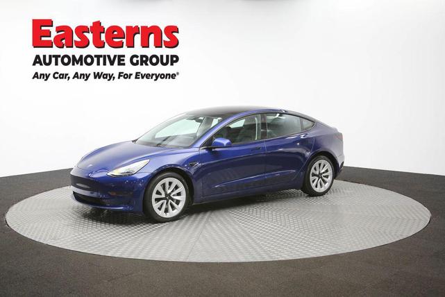 Photo of 2022 Deep Blue Metallic Tesla Model 3